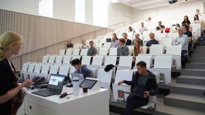 Audience of Meta-Active Annual Meeting in lecture hall
